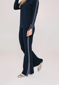 SPODNIE-DZWONY DAMSKIE Z BŁYSZCZĄCYM LAMPASEM ANCORA EBRO